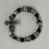 Thumbnail: Black, clear, silver beading with gray cross Forgiven Bracelet.