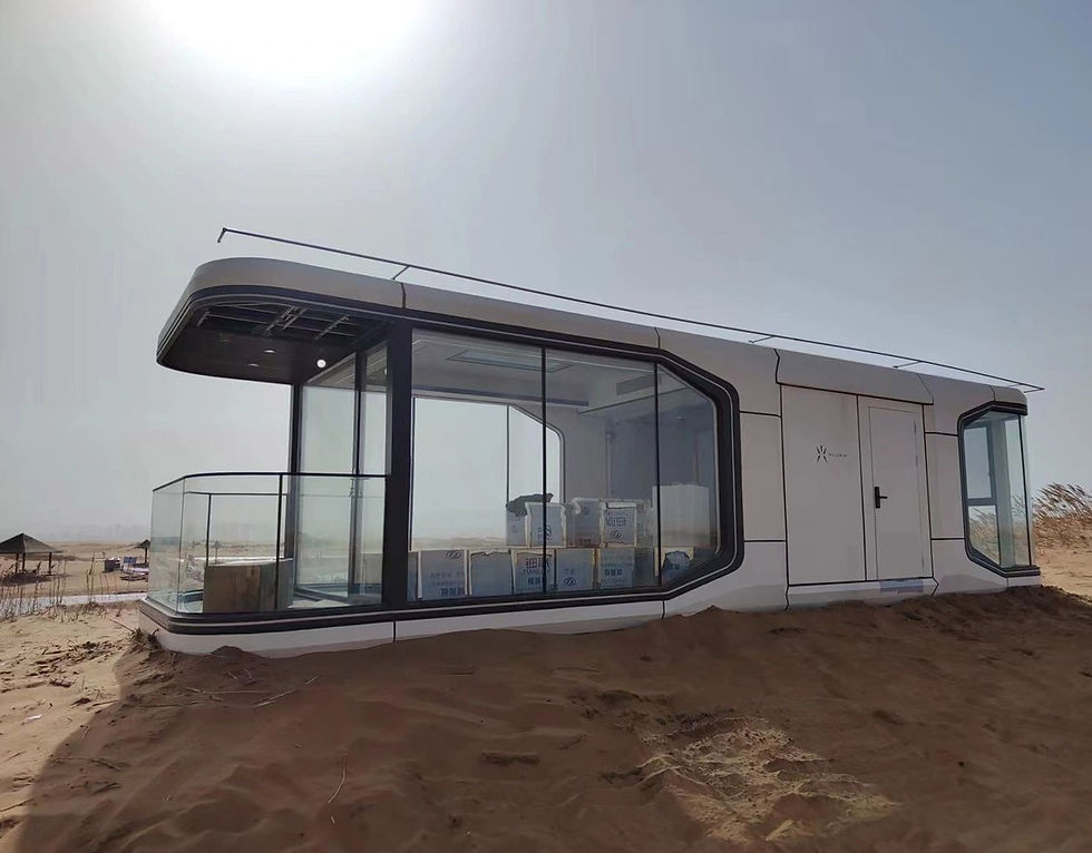Futuristic white Tiny Smart house in desert setting under bright sun, surrounded by sand. Glass walls display interior items, creating a modern look.