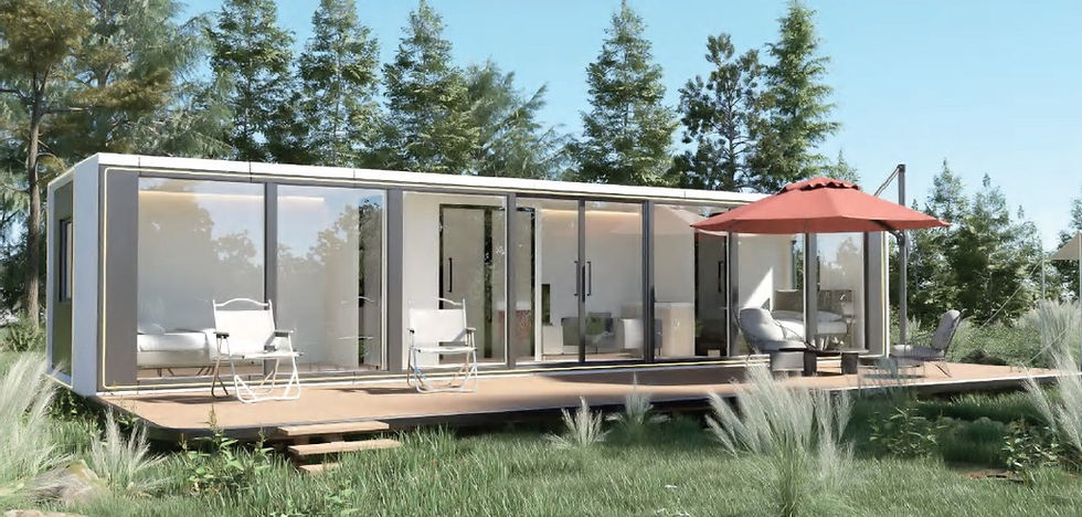 where can you live in a tiny house? A modern container home with glass walls on a wooden deck, outdoor chairs, and a red umbrella. Surrounded by lush greenery and trees.