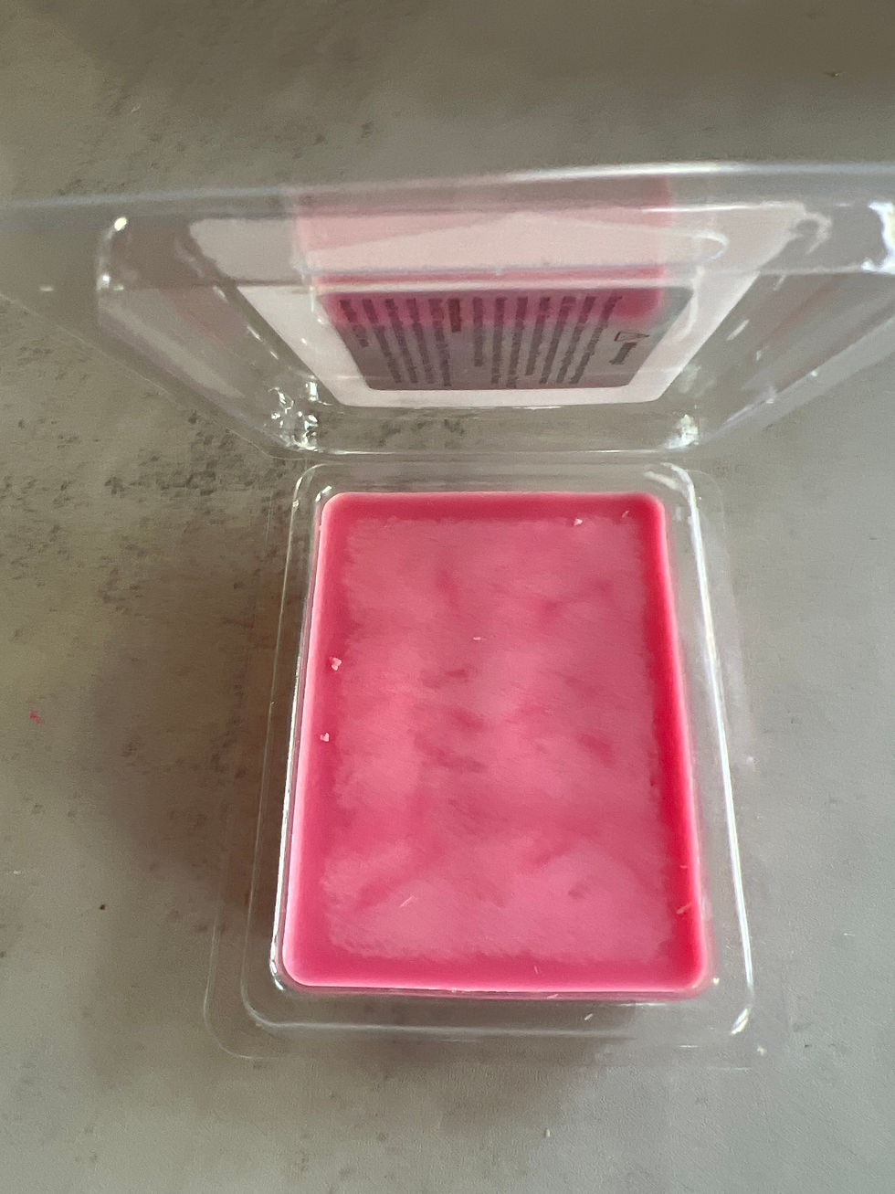 Thumbnail: Pink wax melt in clear container. Strawberry Bliss Soy Wax Melts by The Lakeside Candle Co.