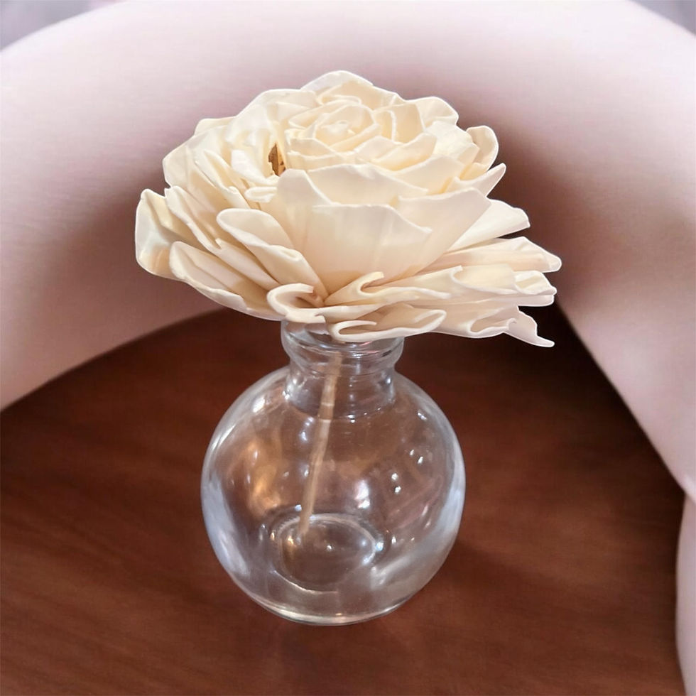 glass jar with flower reed