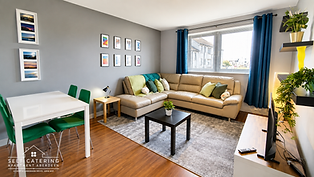 View of dining table for 4 people, leather sofa and living room arrangement, spacious room