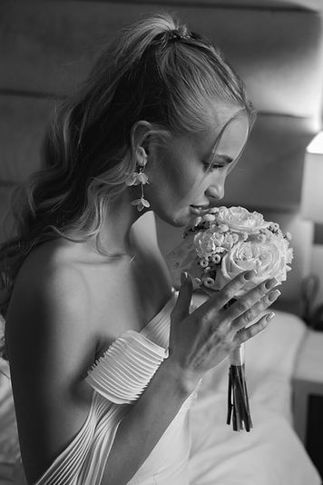 Bride and the flowers_edited.jpg