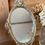 Miniature : Miroir à main ancien en métal doré – décor d’angelots