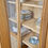 Miniature : Vitrine ancienne en bois clair, portes vitrées et cannage