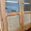 Miniature : Vitrine ancienne en bois clair, portes vitrées et cannage