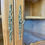 Miniature : Vitrine ancienne en bois clair, portes vitrées et cannage