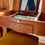 Miniature : Coiffeuse ancienne en bois – miroir relevable et compartiments intérieurs