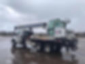 30 Ton Rear Mount truck on a wet road