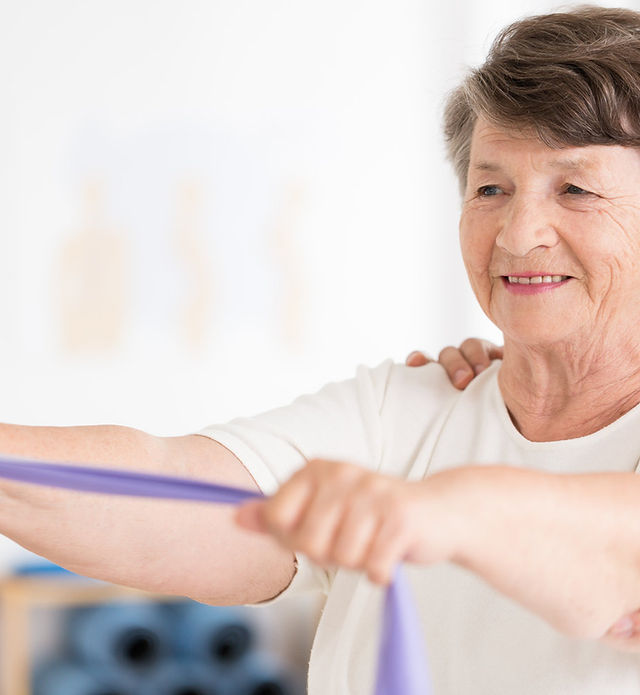 elderly-woman-pulling-elastic-band-PQPS2W7.jpg