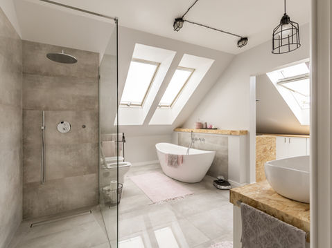 Modern bathroom renovation with new tiles, fixtures, and clean contemporary design