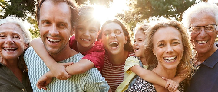 couple gathering with family with their new hearing aids