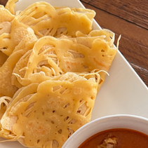 Delighted Bite of Roti Jala (Net Crepes)