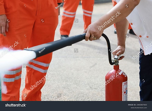 stock-photo-employees-firefighting-training-concept-employees-hand-using-fire-extinguisher