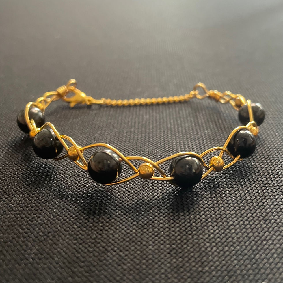 Thumbnail: Gold shungite braid bracelet