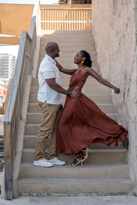 Couple on the stone steps of an old Dubai house