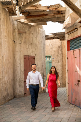 Couple walking down an Old Dubai lane