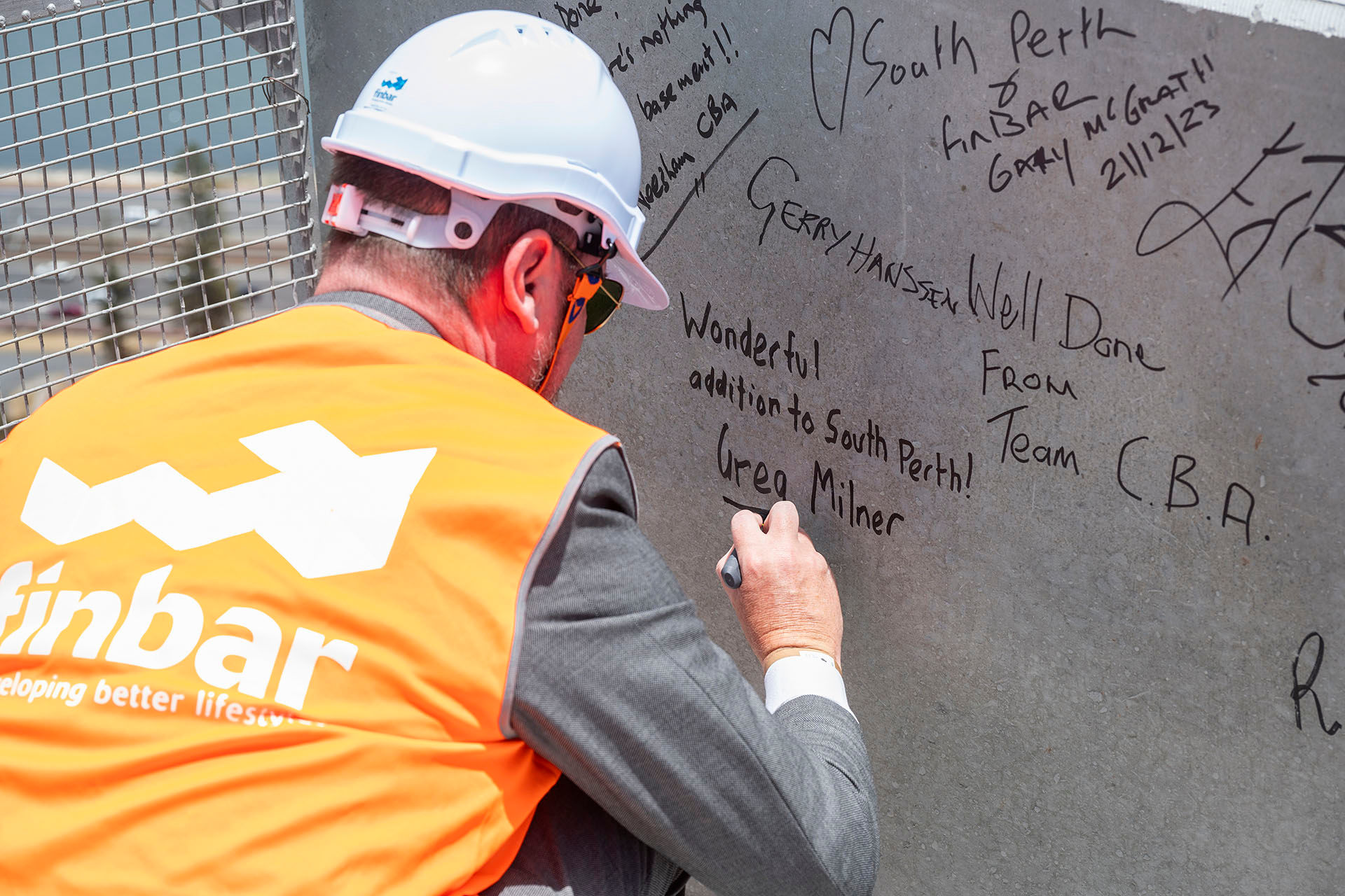 South Perth Mayor, Greg Milner, signing the wall at our Civic Heart topping out ceremony