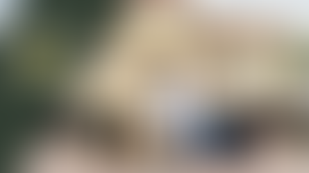 The Barrett School staff outside the Destin, Florida campus with ‘Voted Best STEM Education School in Florida’ badge