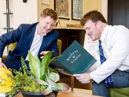 Leaders at The Barrett School discussing educational philosophy in a collaborative meeting in Destin, Florida.