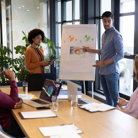 Small group of business partners developing a plan