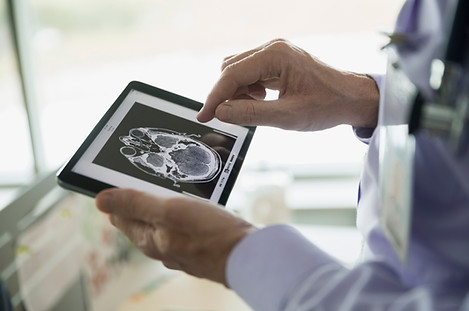 Doctor Examining CT Scan