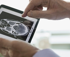 Doctor Examining CT Scan