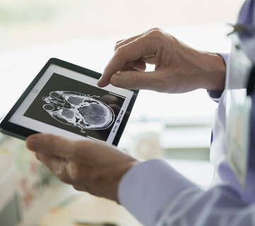 Doctor Examining CT Scan