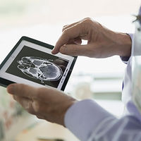 Doctor Examining CT Scan