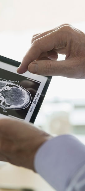 Doctor Examining CT Scan