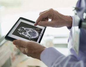 Doctor Examining CT Scan