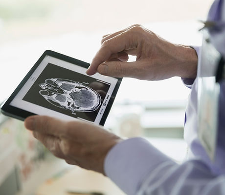 Doctor Examining CT Scan