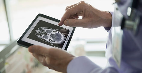 Doctor Examining CT Scan