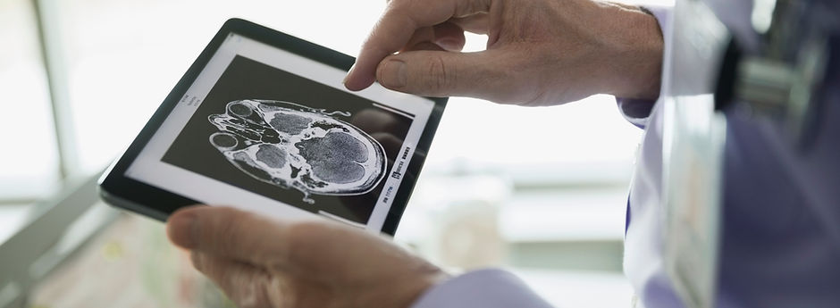 Doctor Examining CT Scan