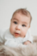 6 month old baby boy with big beautiful eyes