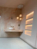 Pink onyx tile with recessed shelves