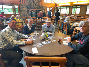 Jeff and Anne Imes, Bill Brackney, and parishioner from St Luke's enjoying the barbeque lunch.