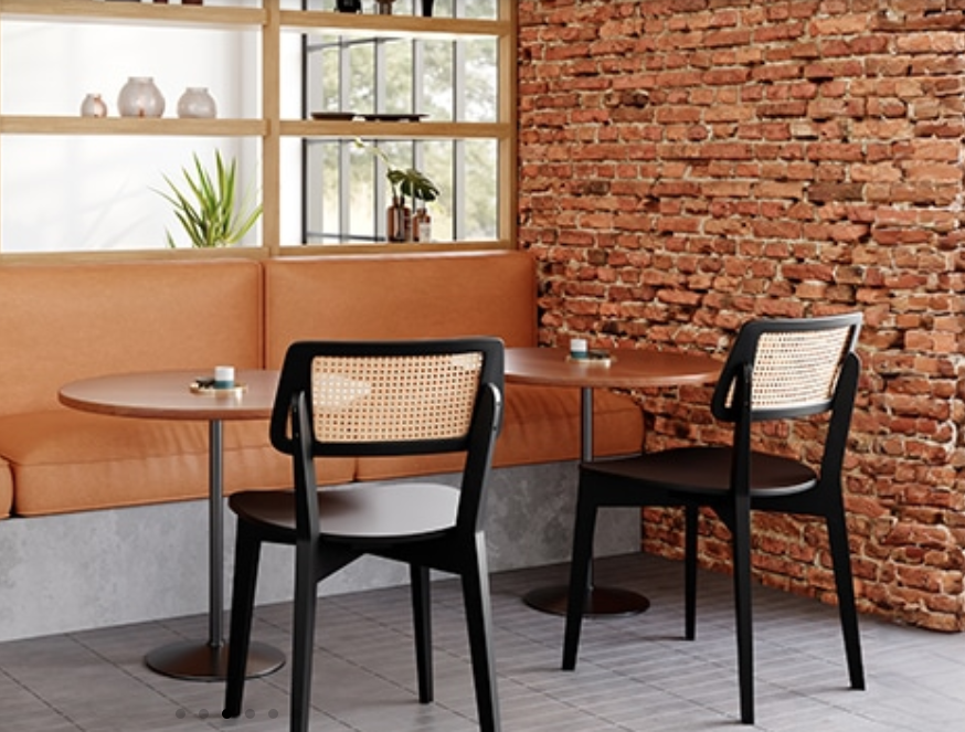 Wide angle view of a modern furniture showroom with various seating options