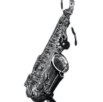 grayscale photo of saxophone on floor_ed