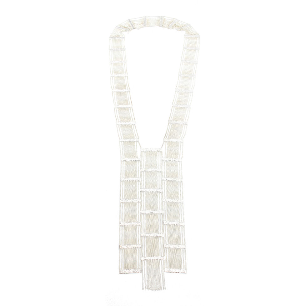 This Large Apron Necklace was selected for the film by the stylists and may be in the film.