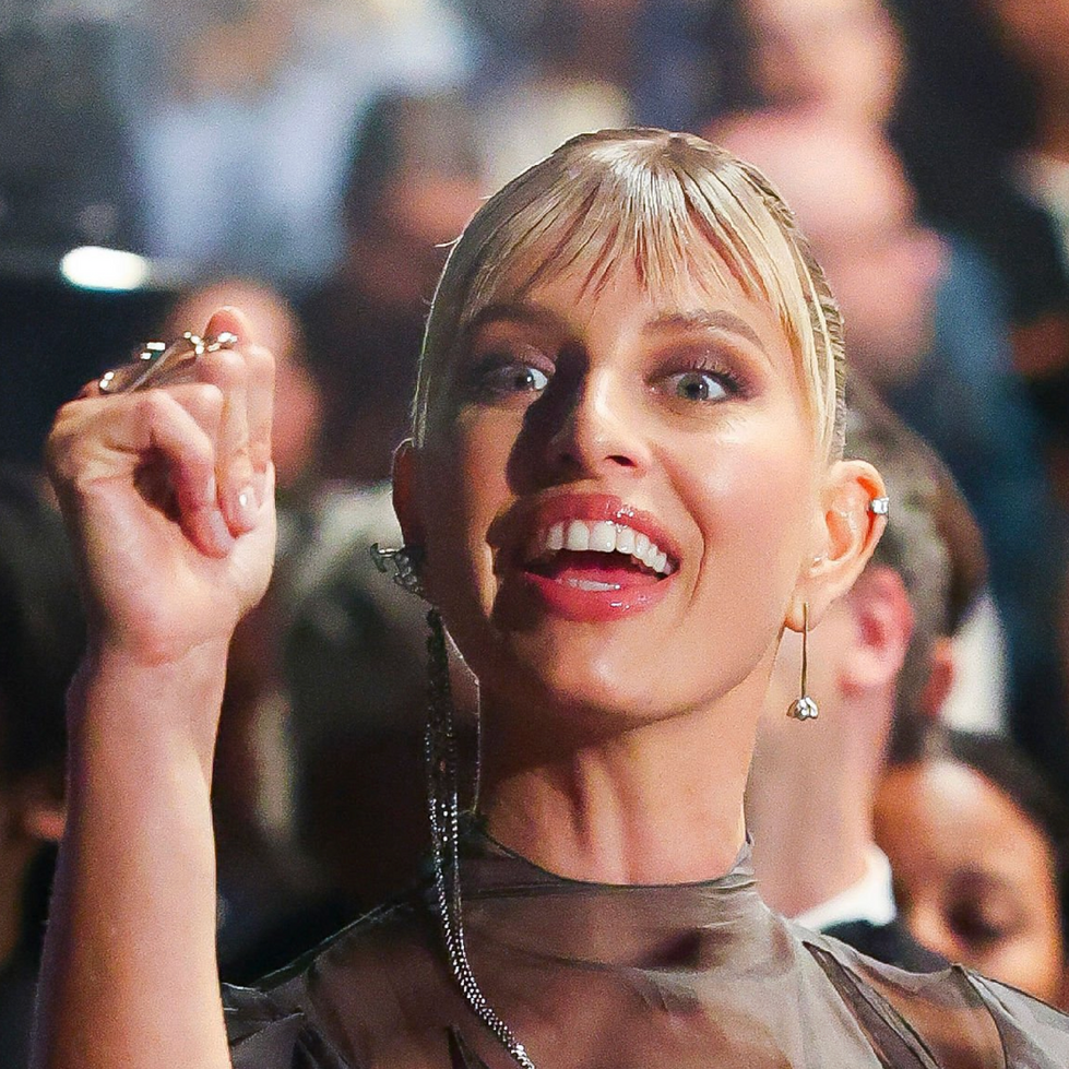 Model Karolina Kurkova wearing Gallery Lulo's Rota Earring, Sigr Ear Cuff, and Flow Ring on the set of The Devil Wears Prada 2