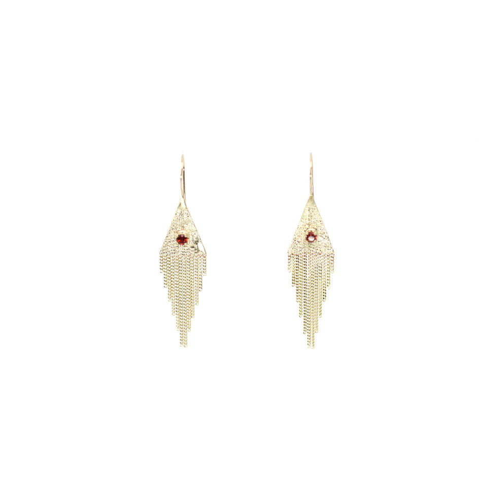 These Lil Triangle Earrings were selected for the film by the stylists and may be in the film.