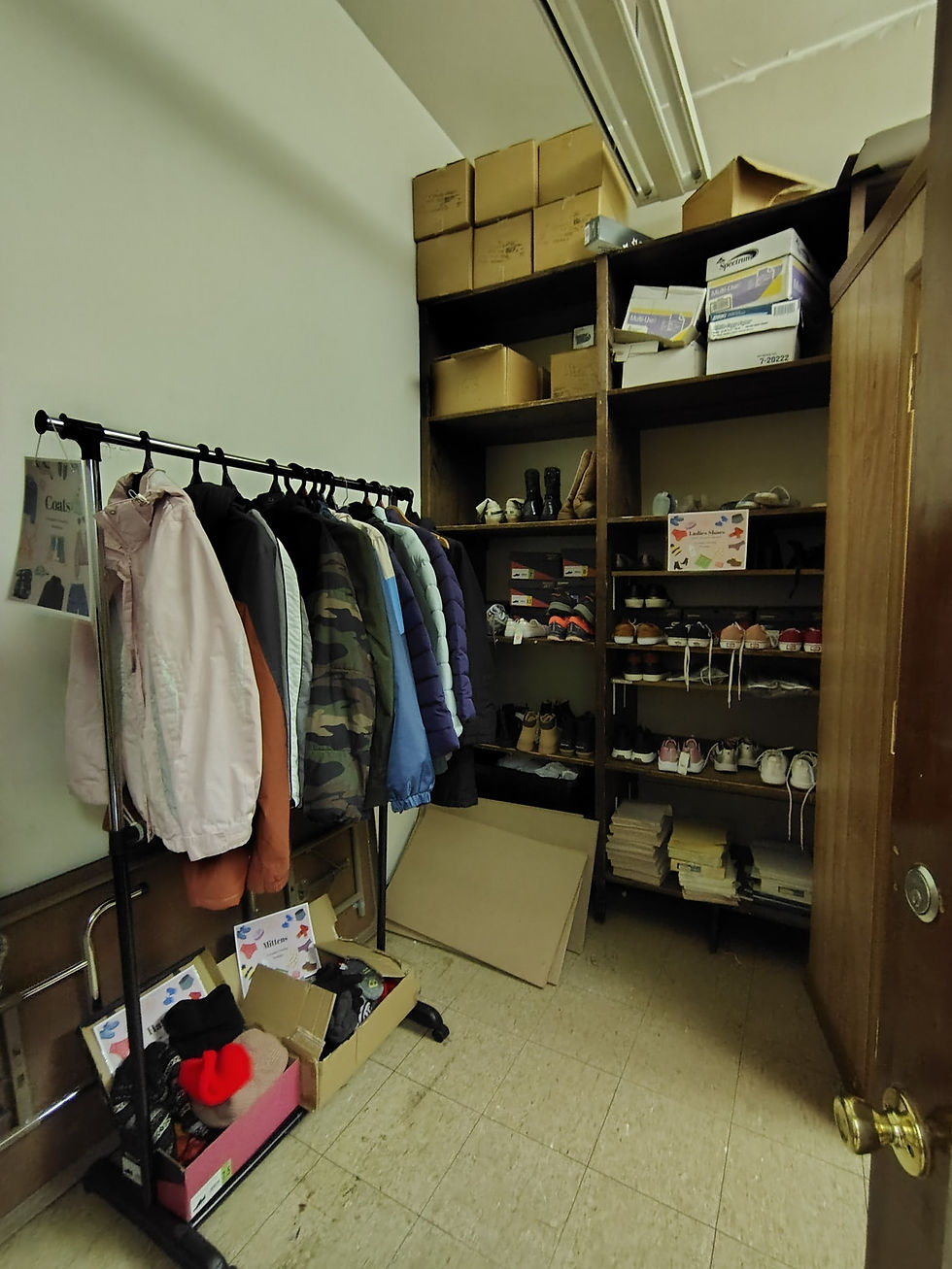 The First Clothing Closet at FAHS was in this tiny, shared closet space. It now houses shoes, winter coats, hats, and gloves.