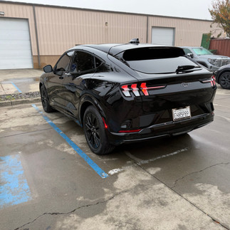 Ford Mach-E full front PPF wrap and coating install results Back view outside our shop