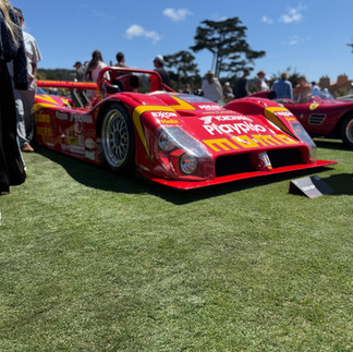 Ferrari at Casa Ferrari detailed at Pebble Beach by Robust Paint Protection & Auto Detailing Race car red