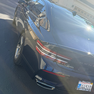 Rear side view of PPF & Coated Genesis G80 by Robust Paint Protection & Auto Detailing in Fairfield