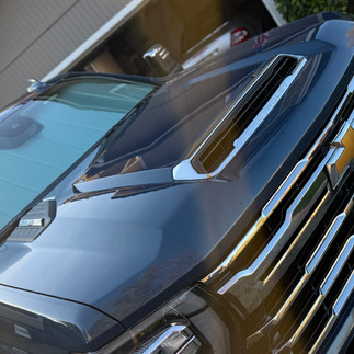 Hood View of Coated New Chevy Silverado in Napa by Robust Paint Protection & Auto Detailing outside customer’s garage