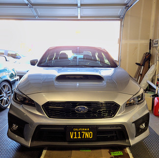 Front View of Subaru WRX Paint Protection Film Install by Robust Paint Protection and Detailing in Fairfield, California, inside customer’s garage
