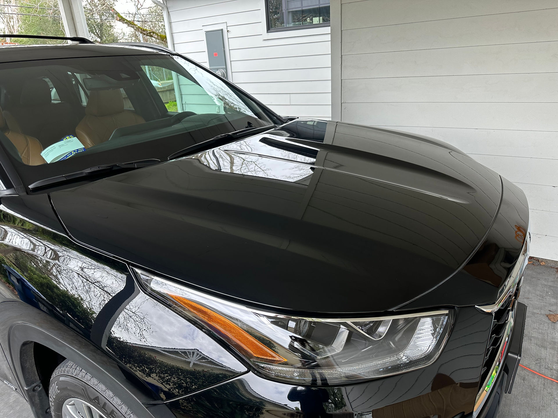 Coated Front Hood of Black Toyota Highlander