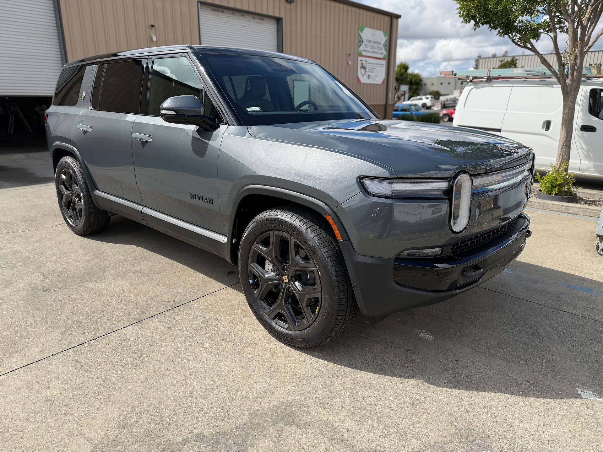 Full clear bra wrap on Rivian R1S in Napa outside our shop